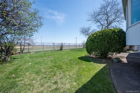 $865,000 | 3905 Greentree Drive, Oceanside, NY 11572