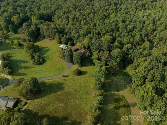 a view of a garden with a building