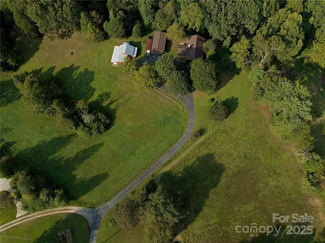 a view of a lake with a yard