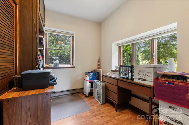 a room with furniture and a window