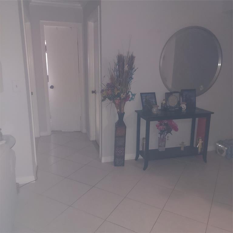 3420 Northwest 47th Avenue, Unit 3143 Pompano Beach, FL 33063 - Photo 13 of 14 wooden floor in an empty room