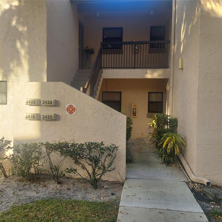 3420 Northwest 47th Avenue, Unit 3143 Pompano Beach, FL 33063 - Photo 10 of 14 a view of front door