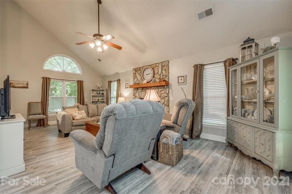 2129 Manawa Lane Tega Cay, SC 29708 - Photo 19 of 42 a living room with furniture and a flat screen tv