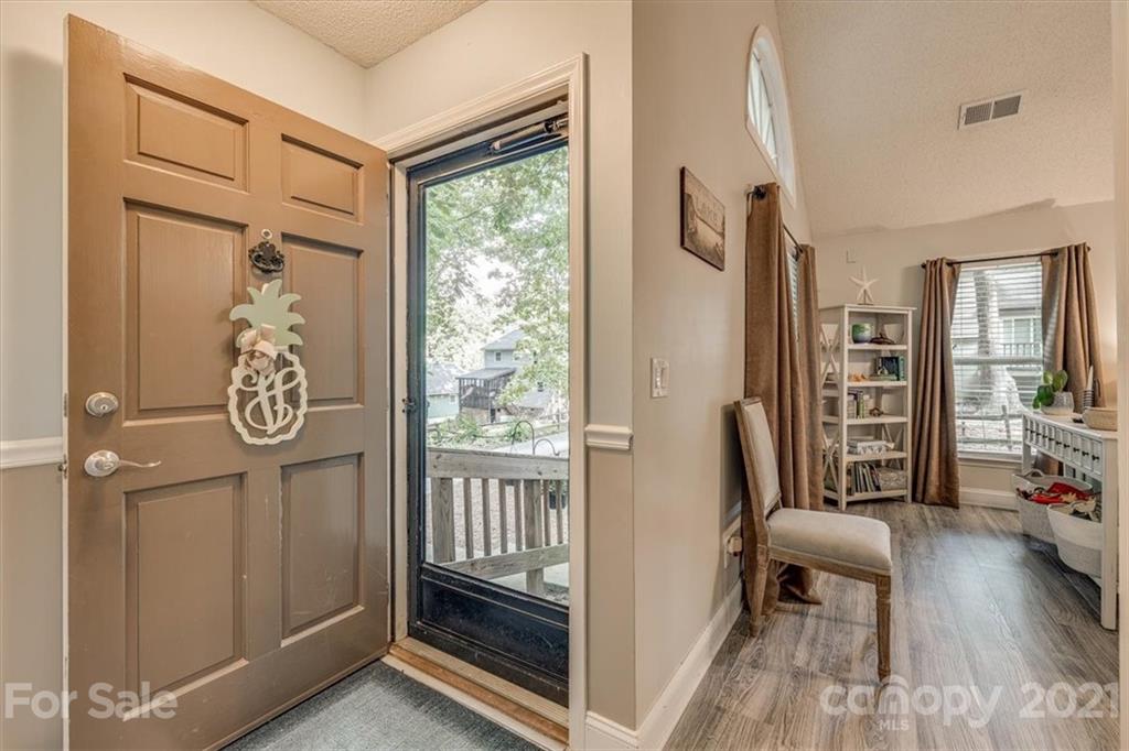 2129 Manawa Lane Tega Cay, SC 29708 - Photo 3 of 42 a view of entryway with wooden floor