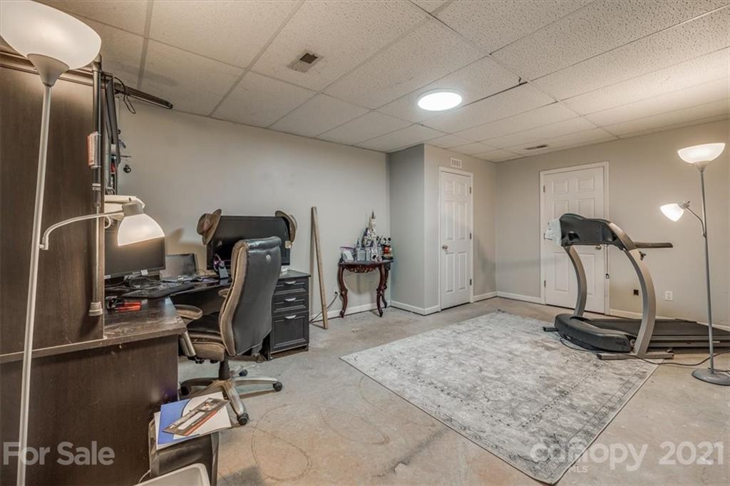 2129 Manawa Lane Tega Cay, SC 29708 - Photo 25 of 42 a view of a room with gym equipment