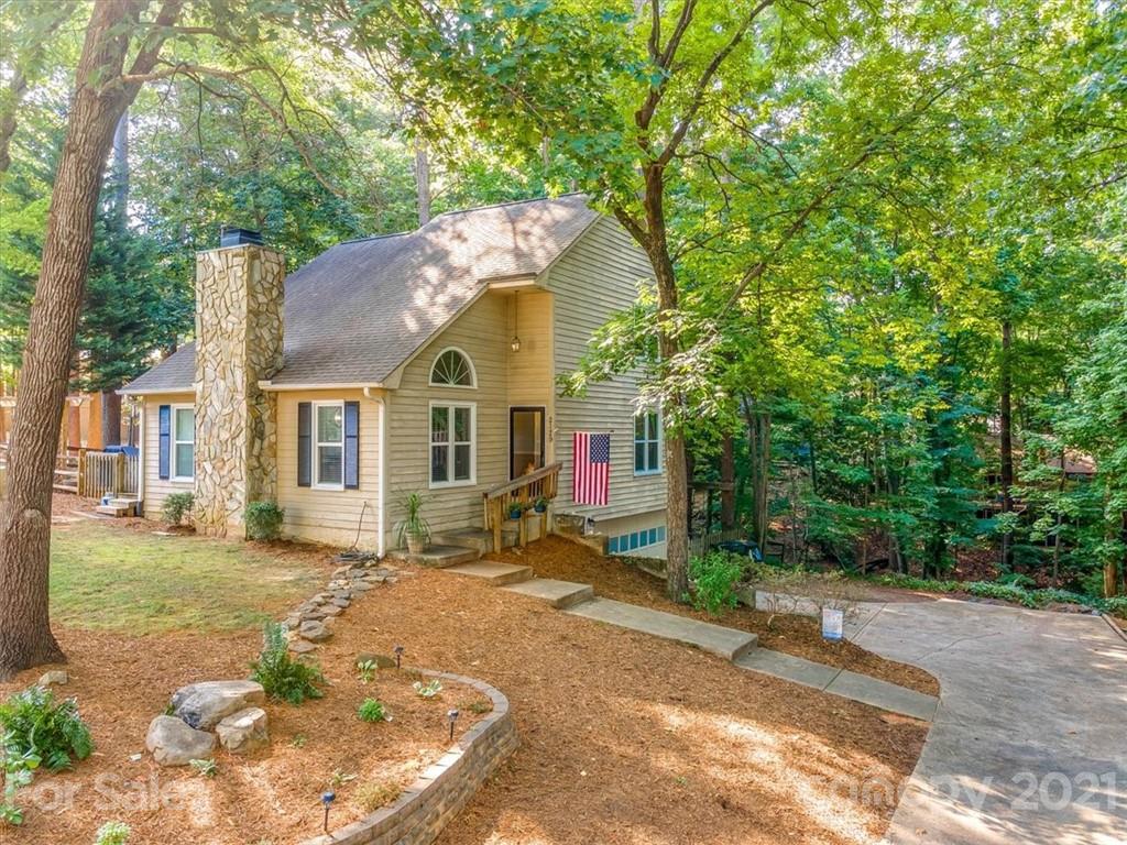 2129 Manawa Lane Tega Cay, SC 29708 - Photo 34 of 42 a view of a house with a yard