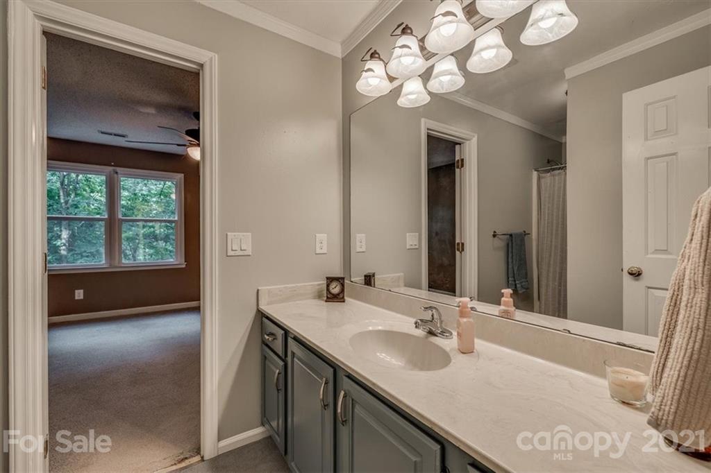 2129 Manawa Lane Tega Cay, SC 29708 - Photo 8 of 42 a en suite bathroom with a sink double vanity and a mirror