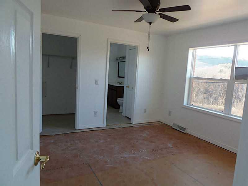882 Joffre Cherry Valley Road Burgettstown, PA 15021 - Photo 11 of 23 Master Bedroom. COZY MASTER WITH WALK IN CLOSET AND SPACIOUS MASTER BATH