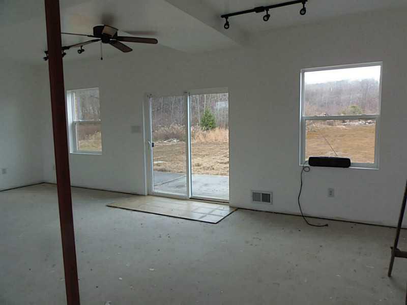 882 Joffre Cherry Valley Road Burgettstown, PA 15021 - Photo 19 of 23 Family Room. THIS SHOWS THE SLIDING DOORS TO REAR CONCRETE PATIO TO REAR OF HOME. WONDERFUL NATURAL LIGHT
