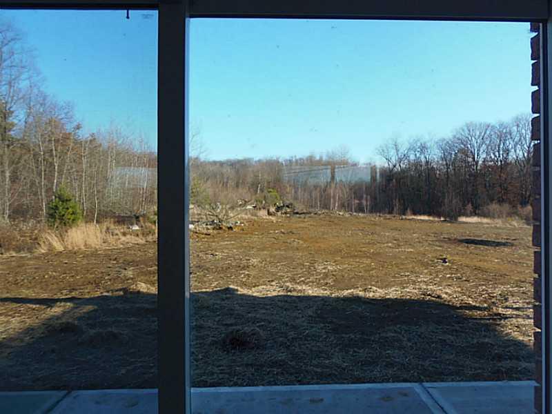 882 Joffre Cherry Valley Road Burgettstown, PA 15021 - Photo 21 of 23 Exterior Back. VIEW FROM LOWER FAMILY /GAME ROOM PATIO DOORS GREAT LEVEL YARD!