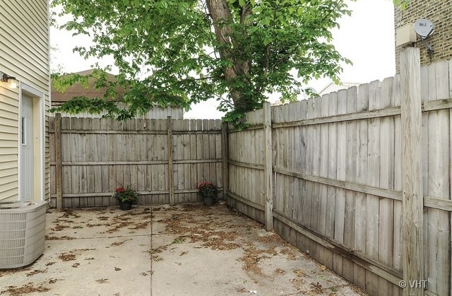 4205 North Bernard Street, Unit R Chicago, IL 60618 - Photo 12 of 12 a view of a backyard