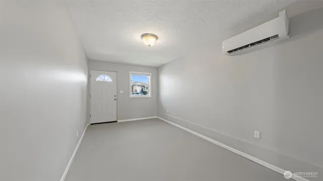 an empty room with windows