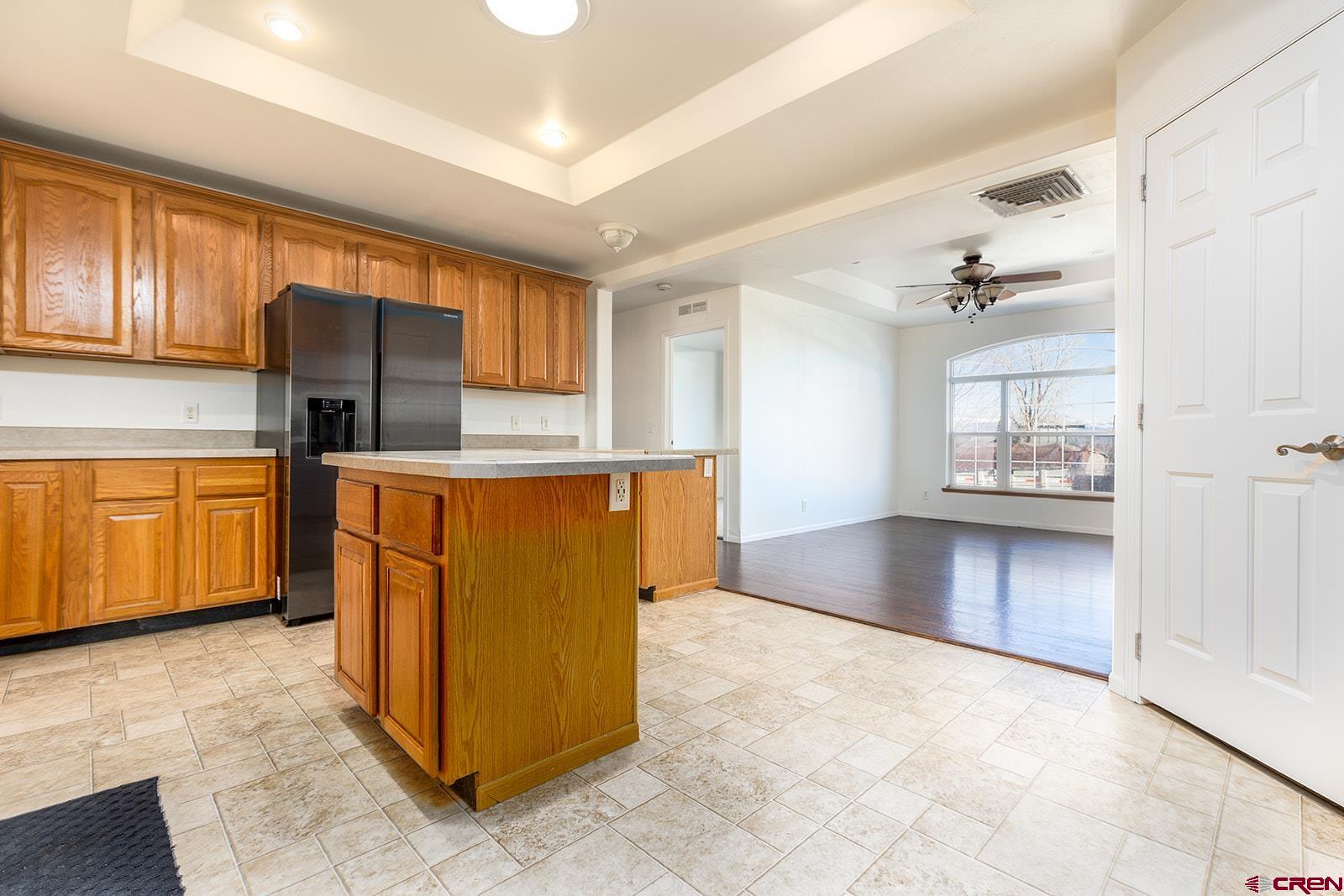17824 B Road Delta, CO 81416 - Photo 8 of 33 a kitchen with stainless steel appliances a refrigerator and cabinets