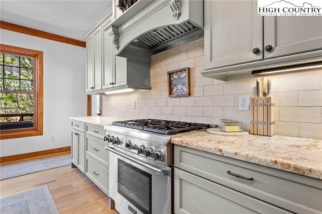 162 Pinecrest Court Boone, NC 28607 - Photo 13 of 50 a stove top oven sitting inside of a kitchen