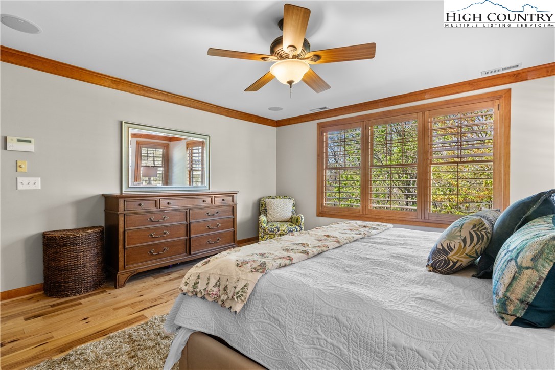 162 Pinecrest Court Boone, NC 28607 - Photo 16 of 50 a bedroom with a bed dresser and a window