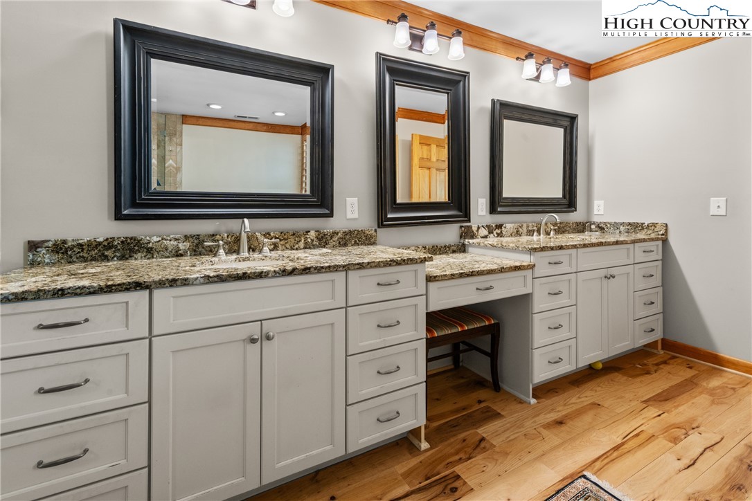 162 Pinecrest Court Boone, NC 28607 - Photo 19 of 50 a bathroom with a double vanity sink and mirror