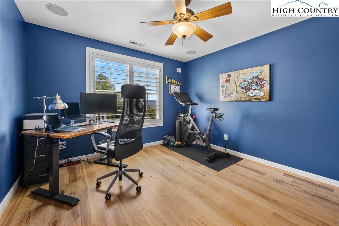 162 Pinecrest Court Boone, NC 28607 - Photo 22 of 50 a view of a workspace with furniture and a window