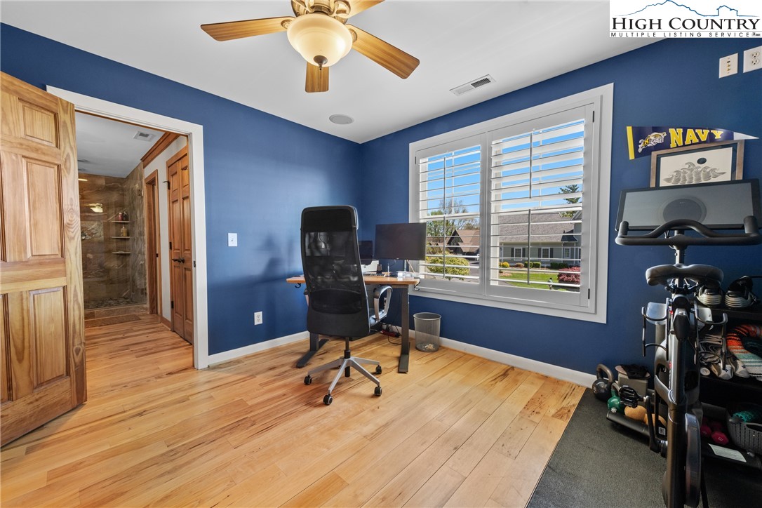 162 Pinecrest Court Boone, NC 28607 - Photo 23 of 50 a view of a workspace with furniture and a window