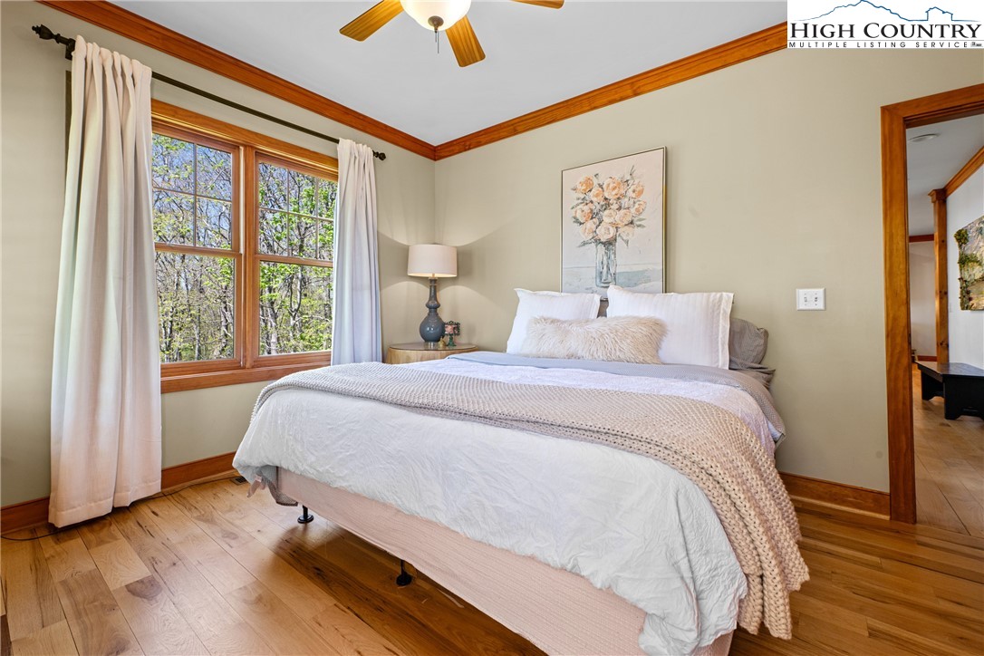 162 Pinecrest Court Boone, NC 28607 - Photo 24 of 50 a bedroom with a bed and a large window