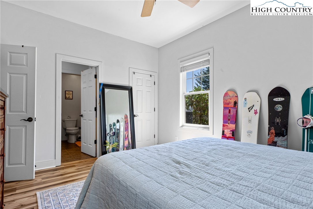 162 Pinecrest Court Boone, NC 28607 - Photo 28 of 50 a bedroom with a bed and a large mirror on the dresser