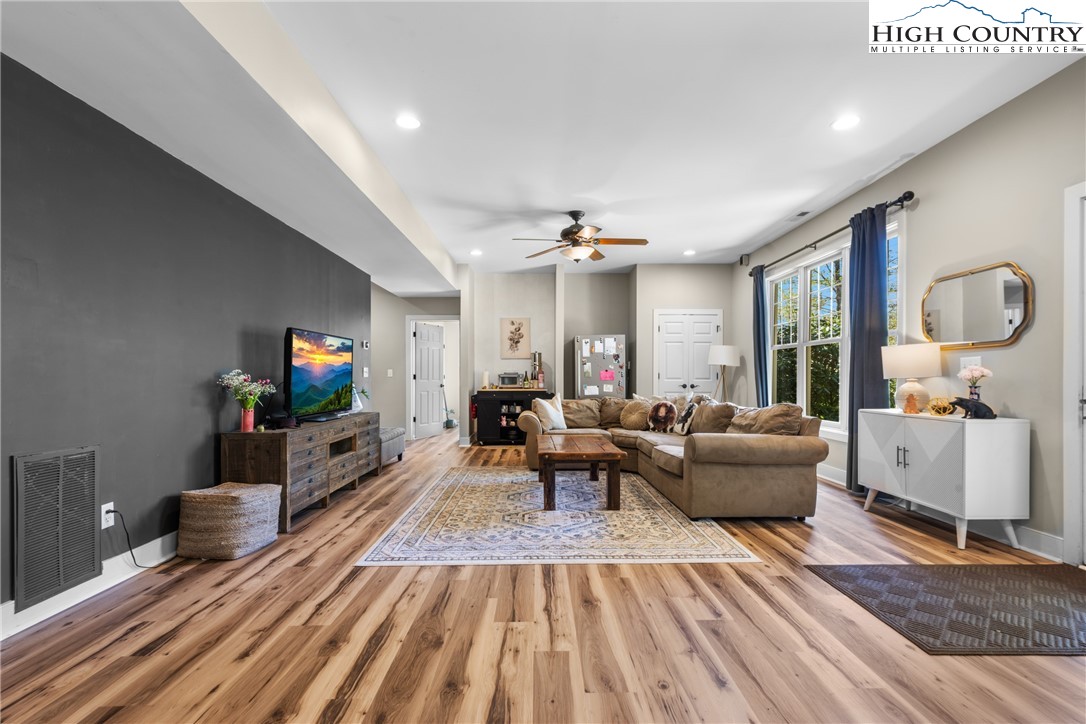 162 Pinecrest Court Boone, NC 28607 - Photo 32 of 50 a living room with furniture and a flat screen tv