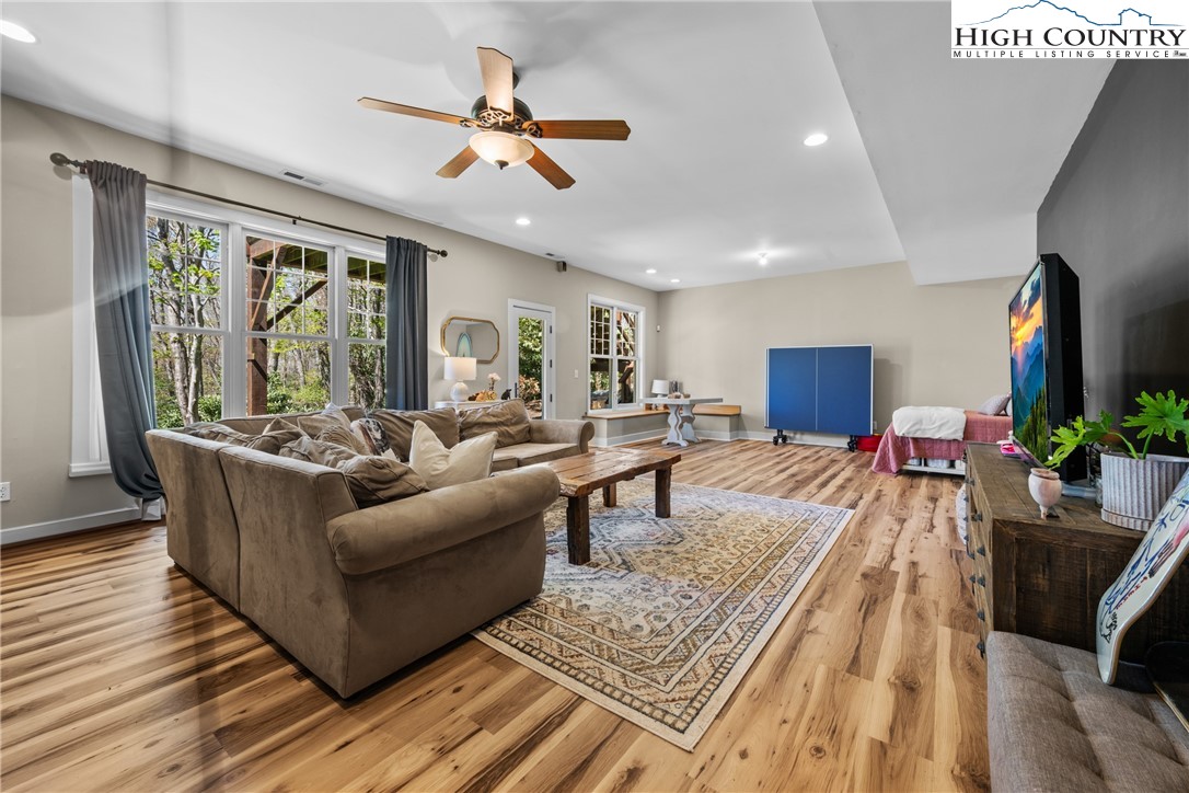 162 Pinecrest Court Boone, NC 28607 - Photo 34 of 50 a living room with furniture and a large window