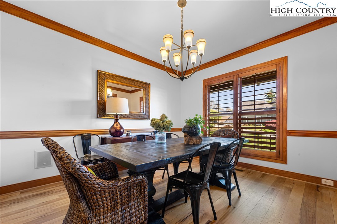 162 Pinecrest Court Boone, NC 28607 - Photo 4 of 50 a view of a dining room with furniture window and wooden floor