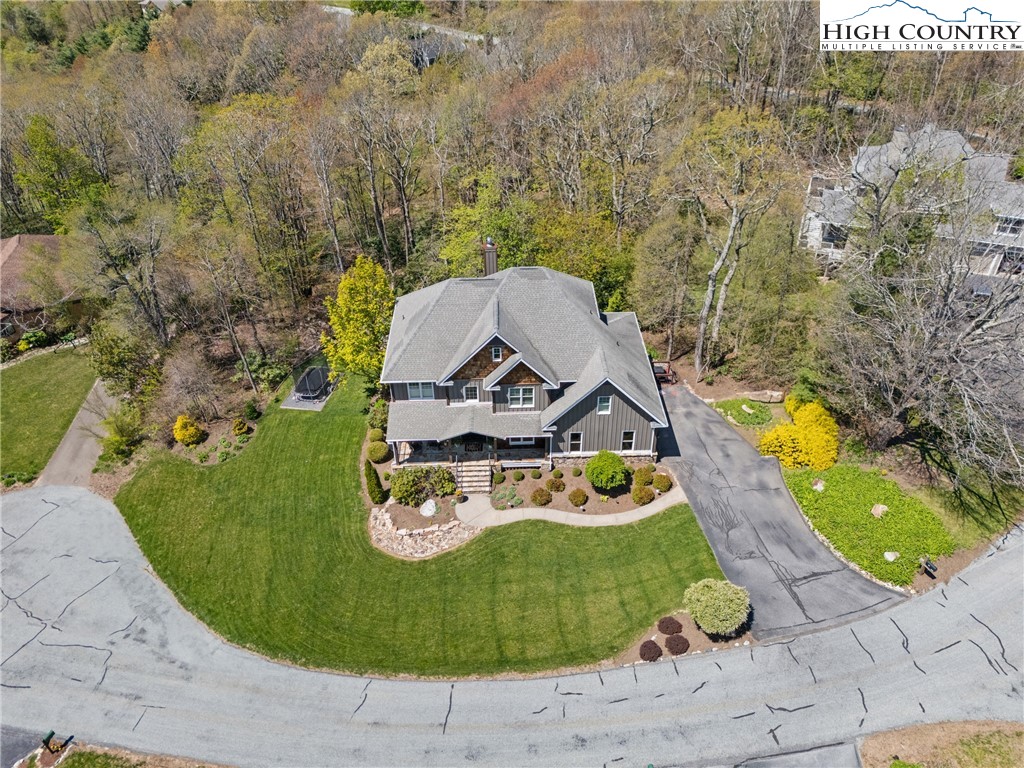 162 Pinecrest Court Boone, NC 28607 - Photo 42 of 50 an aerial view of a house with a swimming pool
