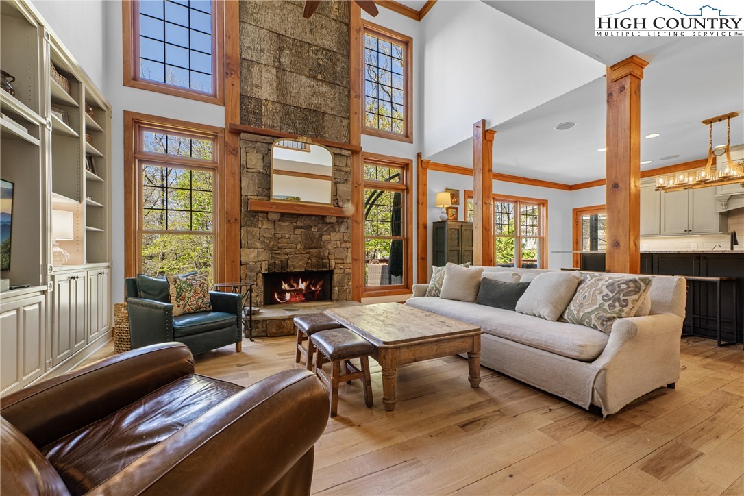 162 Pinecrest Court Boone, NC 28607 - Photo 6 of 50 a living room with furniture fireplace and a large window