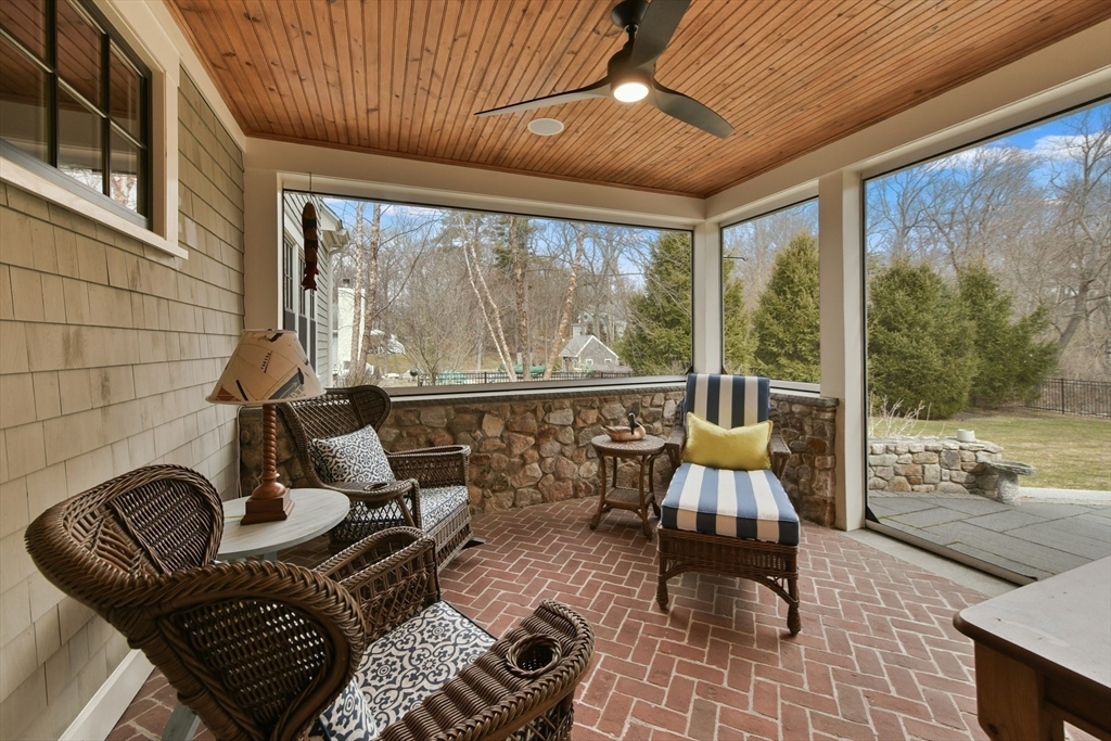 19 Smith Road Hingham, MA 02043 - Photo 14 of 18 a living room with furniture and a floor to ceiling window
