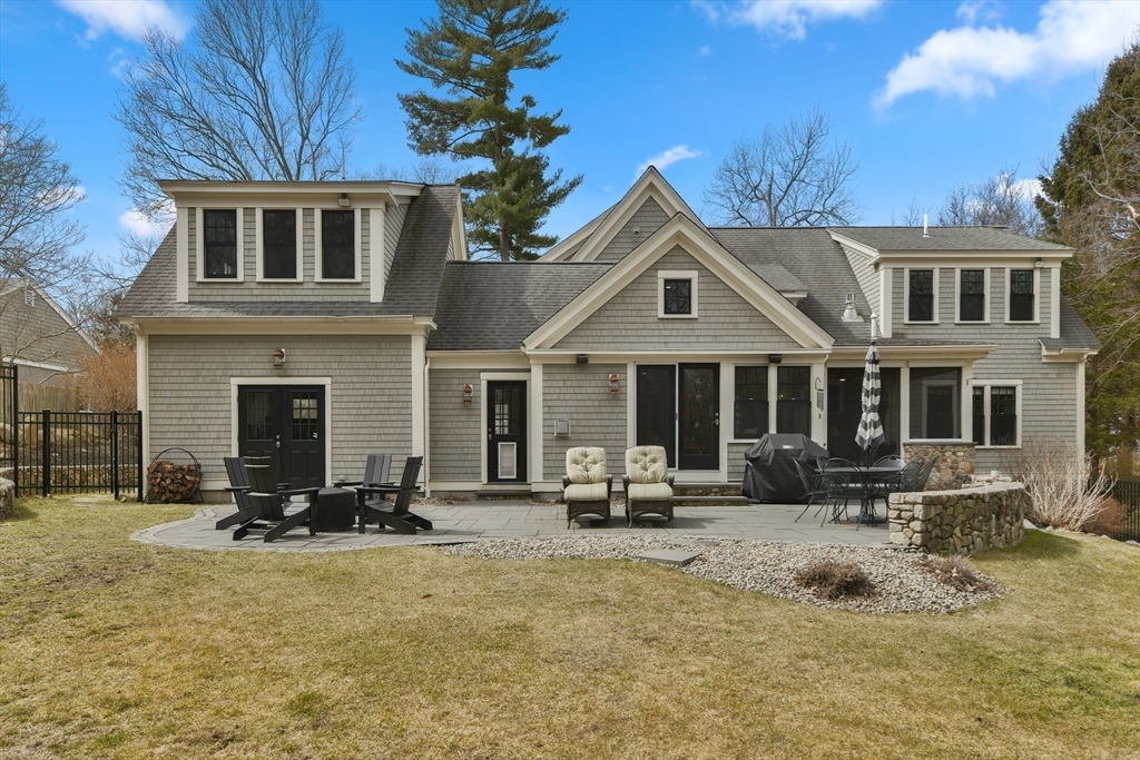 19 Smith Road Hingham, MA 02043 - Photo 17 of 18 a view of a house with a barbeque and sitting area