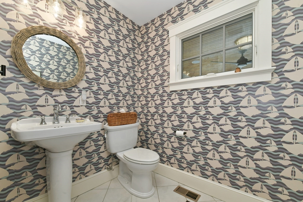 19 Smith Road Hingham, MA 02043 - Photo 6 of 18 a bathroom with a toilet and a sink