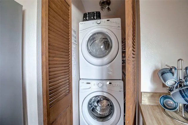 a view of livingroom with washer and dryer