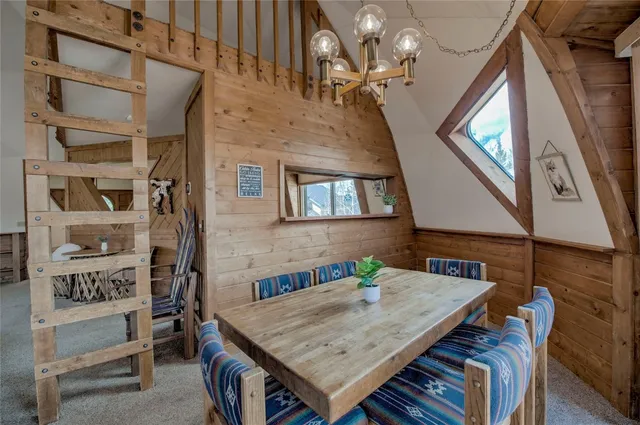 a view of a livingroom with furniture and window