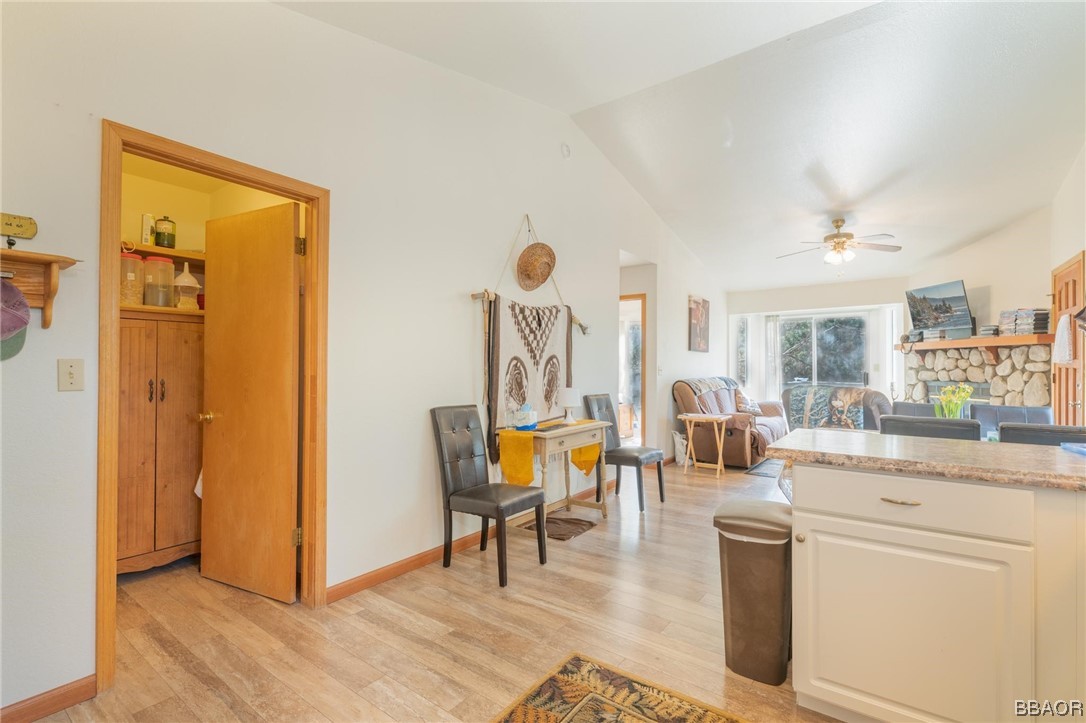 124 Riverside Avenue Sugarloaf, CA 92386 - Photo 7 of 22 a living room with fireplace furniture and a table