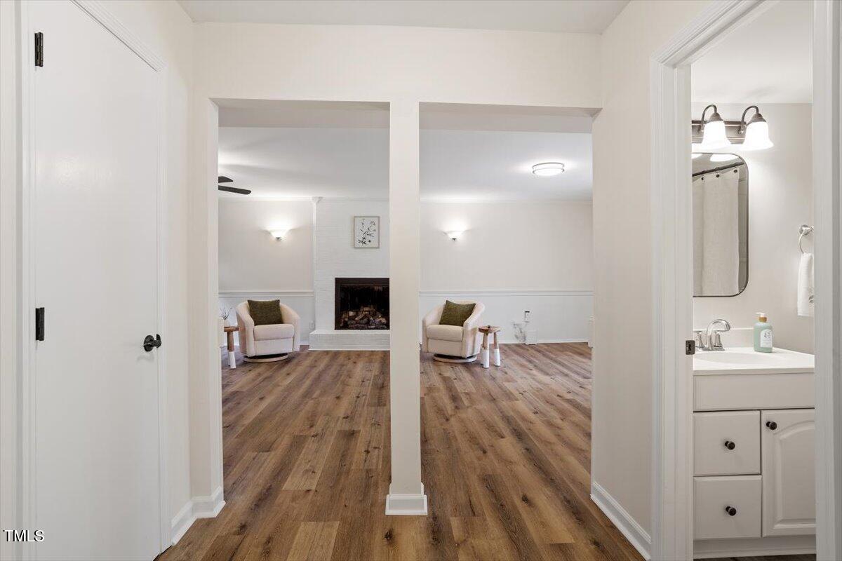 1203 Brookgreen Drive Cary, NC 27511 - Photo 32 of 46 a view of a bathroom with sink mirror and bathtub