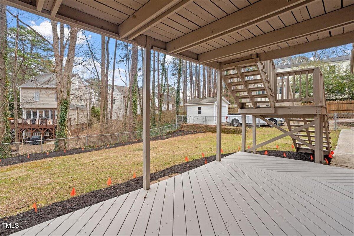 1203 Brookgreen Drive Cary, NC 27511 - Photo 40 of 46 a view of a balcony with wooden floor