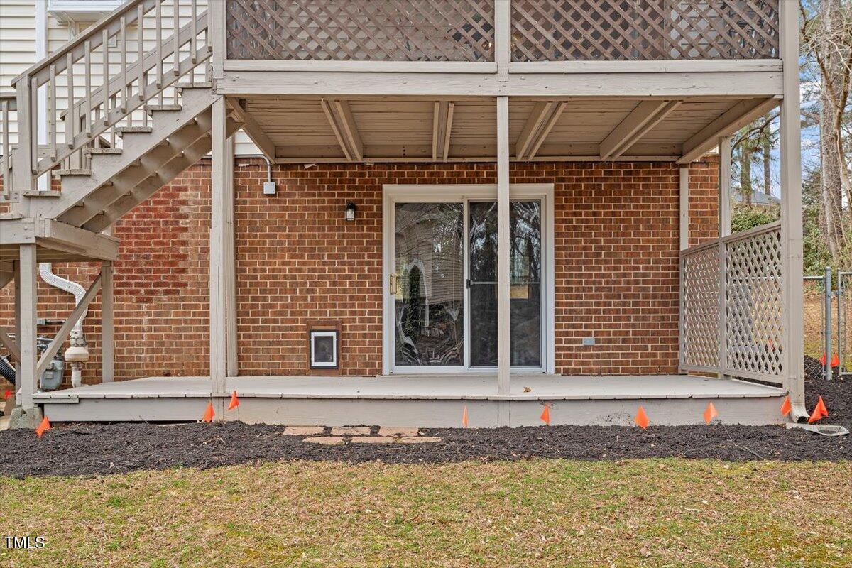 1203 Brookgreen Drive Cary, NC 27511 - Photo 41 of 46 a front view of a house with a yard