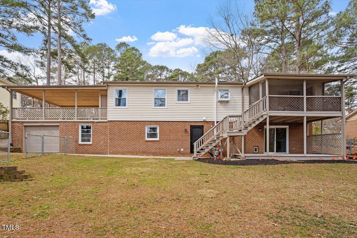 1203 Brookgreen Drive Cary, NC 27511 - Photo 43 of 46 front view of house with a yard