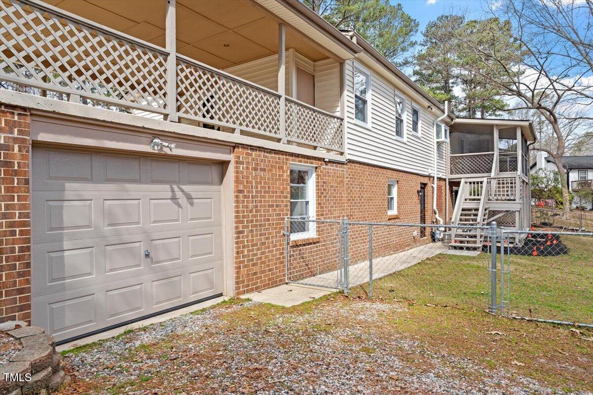 1203 Brookgreen Drive Cary, NC 27511 - Photo 44 of 46 a view of a house with a outdoor space