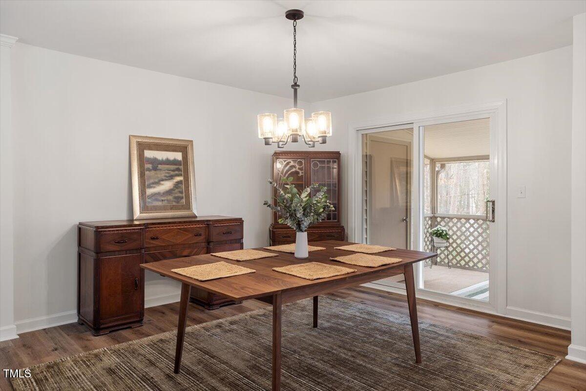 1203 Brookgreen Drive Cary, NC 27511 - Photo 9 of 46 a view of a room with furniture window and wooden floor