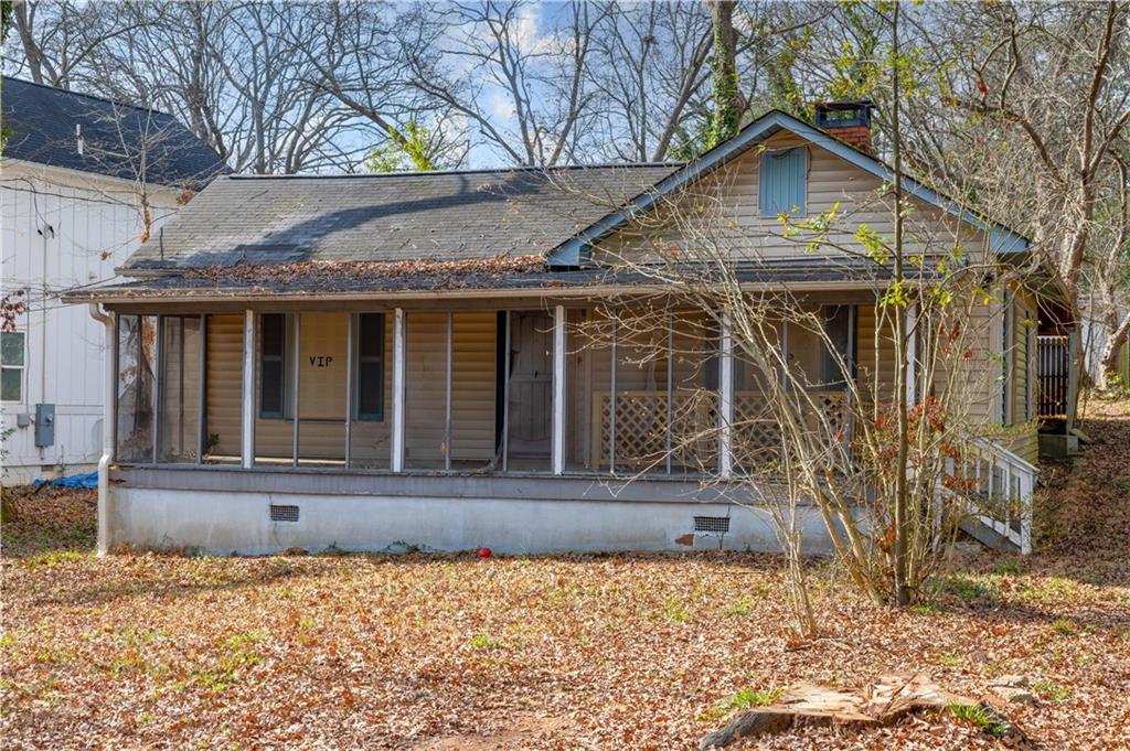 2965 Pearl Street East Point, GA 30344 - Photo 3 of 5 a front view of a house with garden