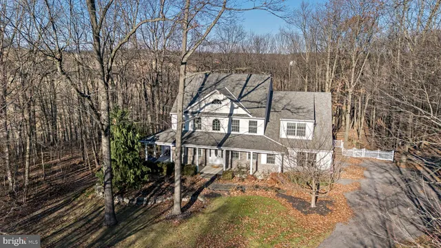 a front view of a house with yard