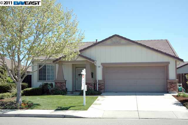 1727 Sutter Street Livermore, CA 94551 - Photo 1 of 1 a front view of a house with a yard and garage