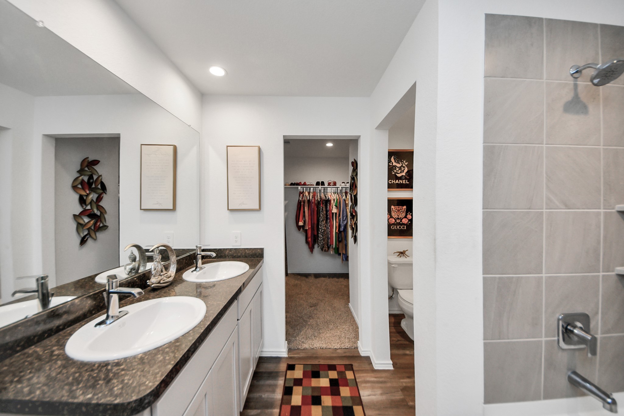 5715 Aspen Acres Drive Spring, TX 77373 - Photo 14 of 24 a bathroom with a granite countertop sink a mirror and shower