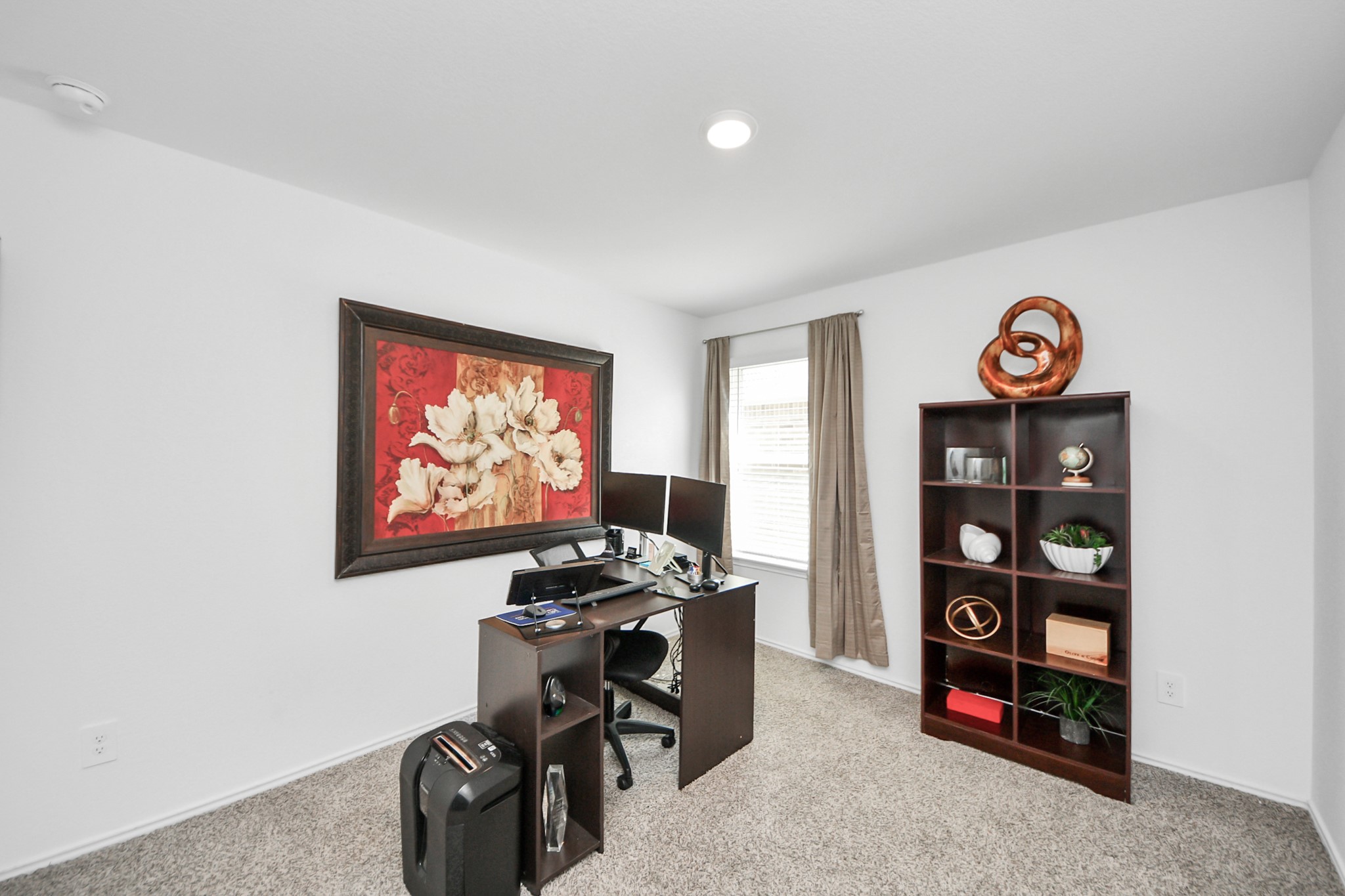 5715 Aspen Acres Drive Spring, TX 77373 - Photo 17 of 24 a view of a workspace with furniture and a window