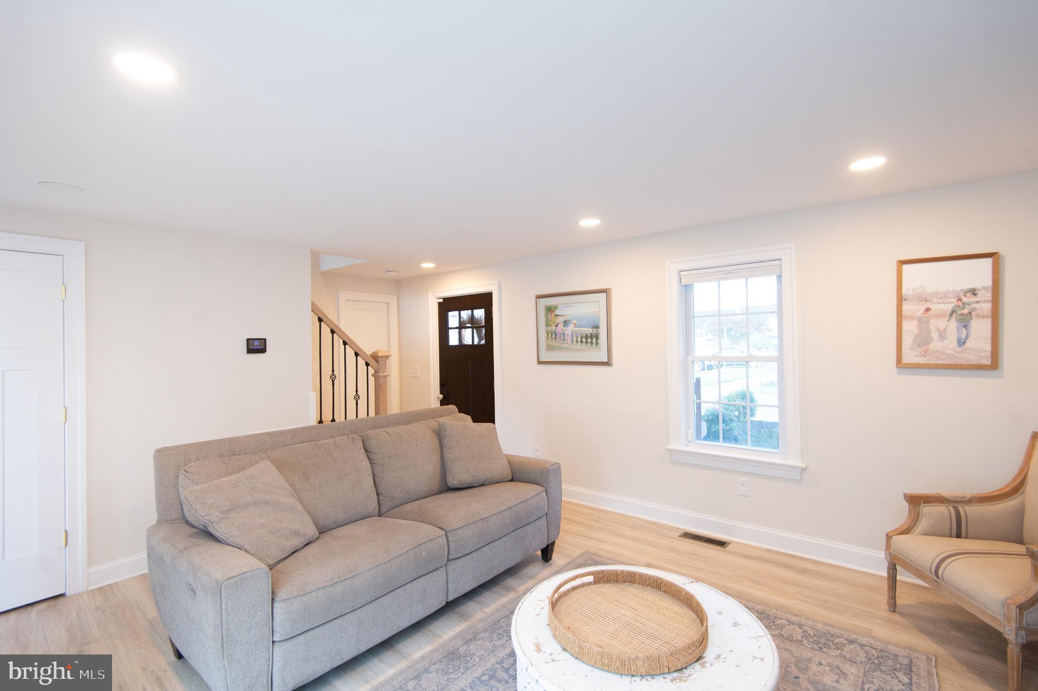 110 Second Street Secretary, MD 21664 - Photo 13 of 36 a living room with furniture and a window