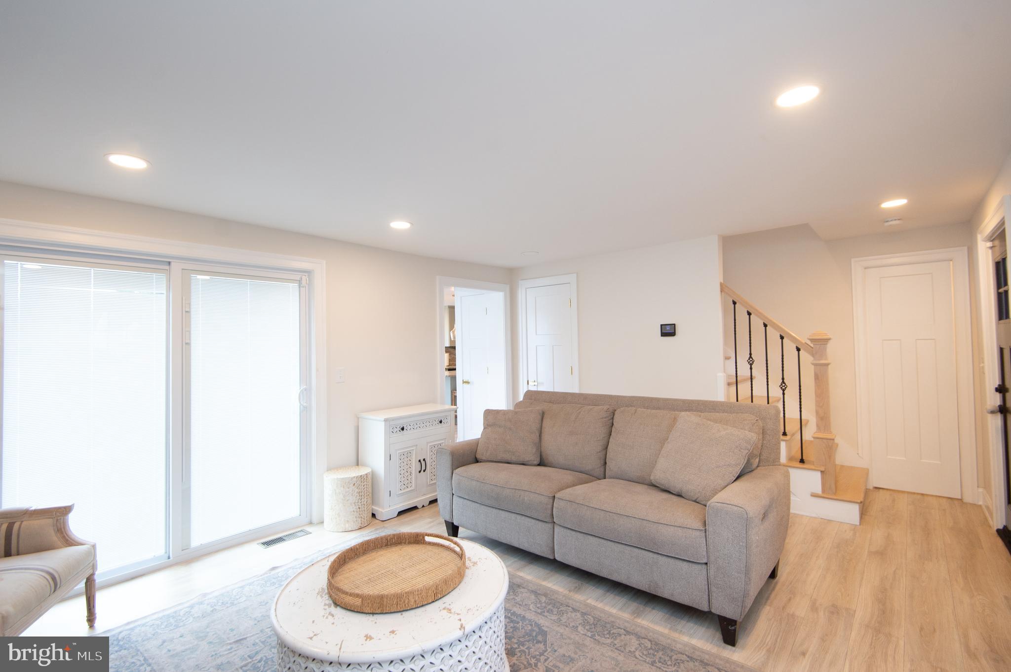 110 Second Street Secretary, MD 21664 - Photo 14 of 36 a living room with furniture and a wooden floor