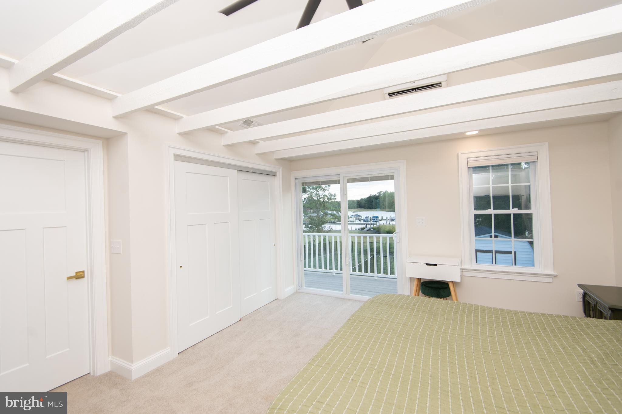 110 Second Street Secretary, MD 21664 - Photo 18 of 36 a view of empty room with windows