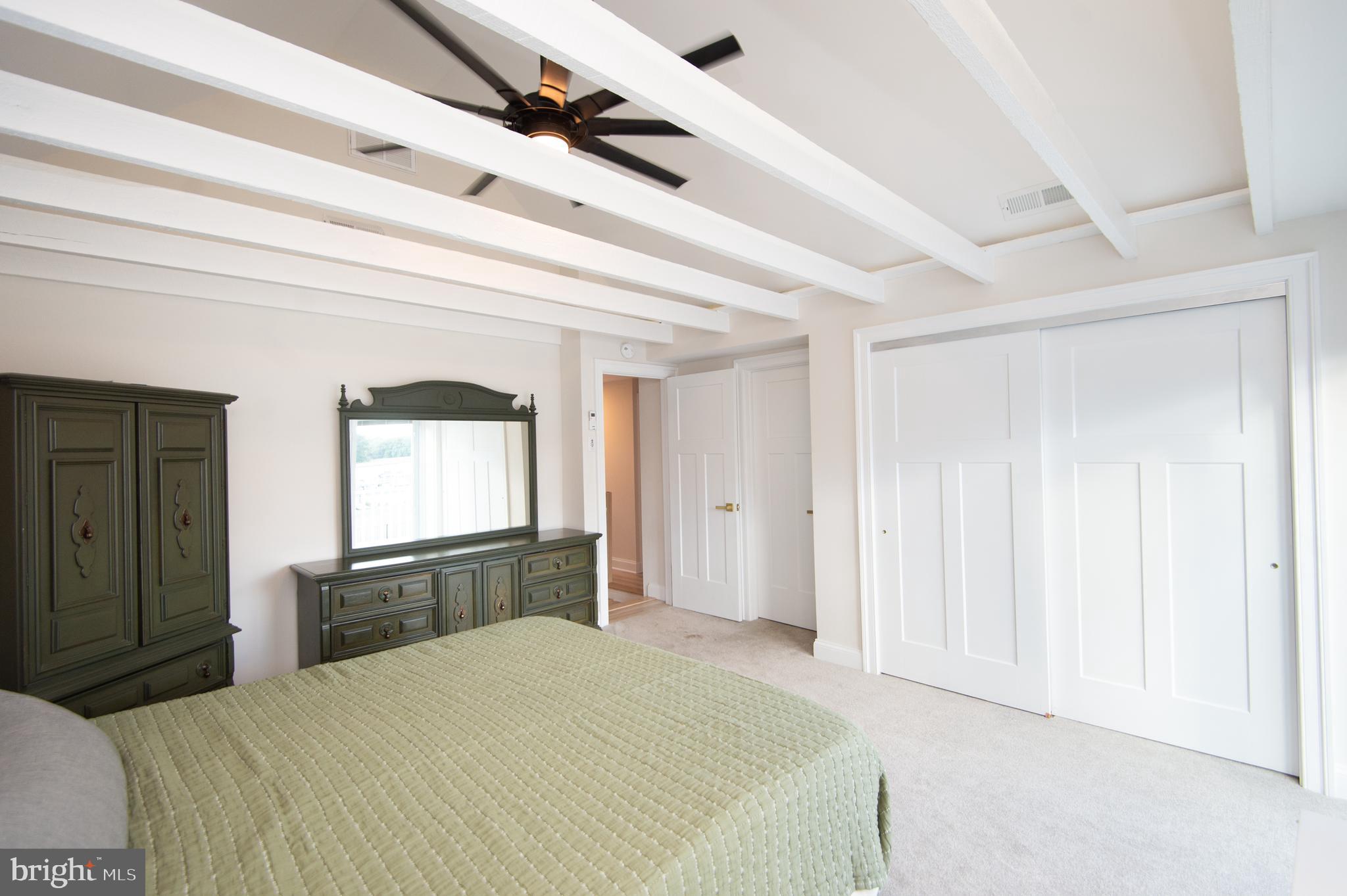 110 Second Street Secretary, MD 21664 - Photo 20 of 36 a bedroom with a bed and a window